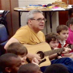 David Neches with guitar 240 x 240